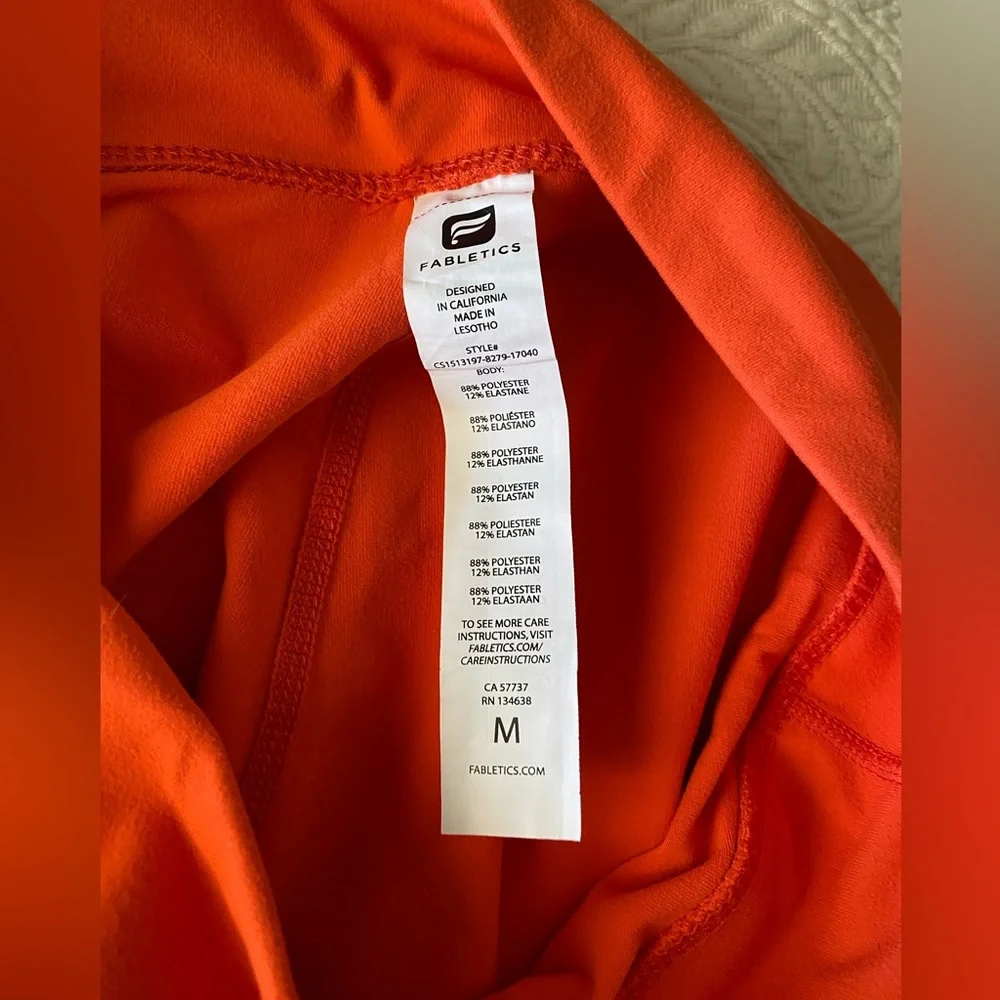 FABLETICS Crop Leggings; orange. - Picture 3 of 7